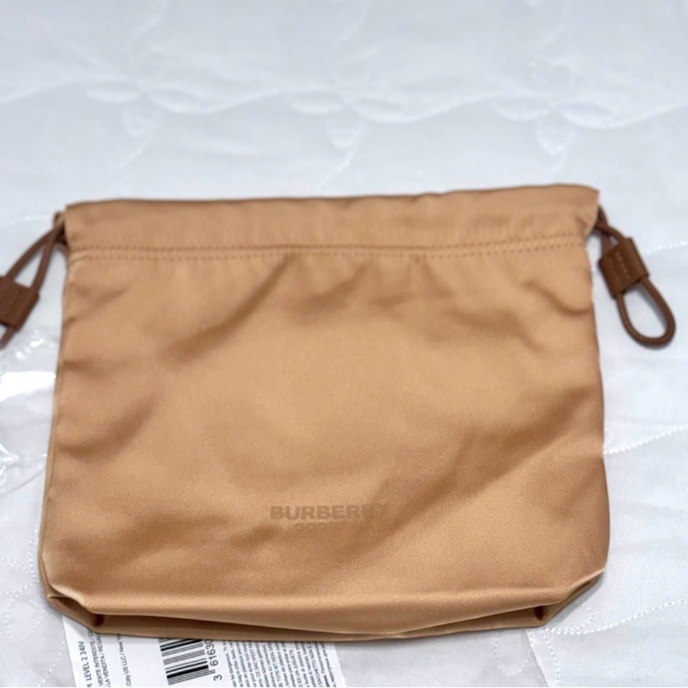 Burberry Beige Drawstring Cosmetic Pouch.
